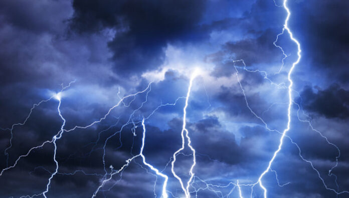 Thunder, lightnings and rain during summer storm.